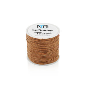 A spool of brown NTR Plaiting Thread on a white background.