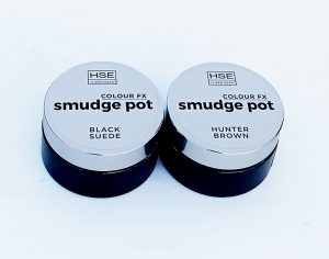 Two HSE Smudge Pots on a white surface.