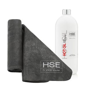 A black towel and bottle with the word HSE on it, part of the HSE Hot Oil & CoolGroom Combo.